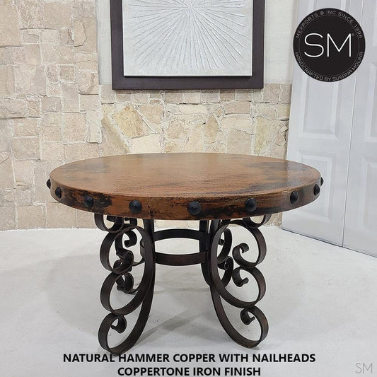 Mexports by Susana Molina 60" Natural Hammered Copper With Nailheads on Edge Round Dining Table With Hand-Forged Base