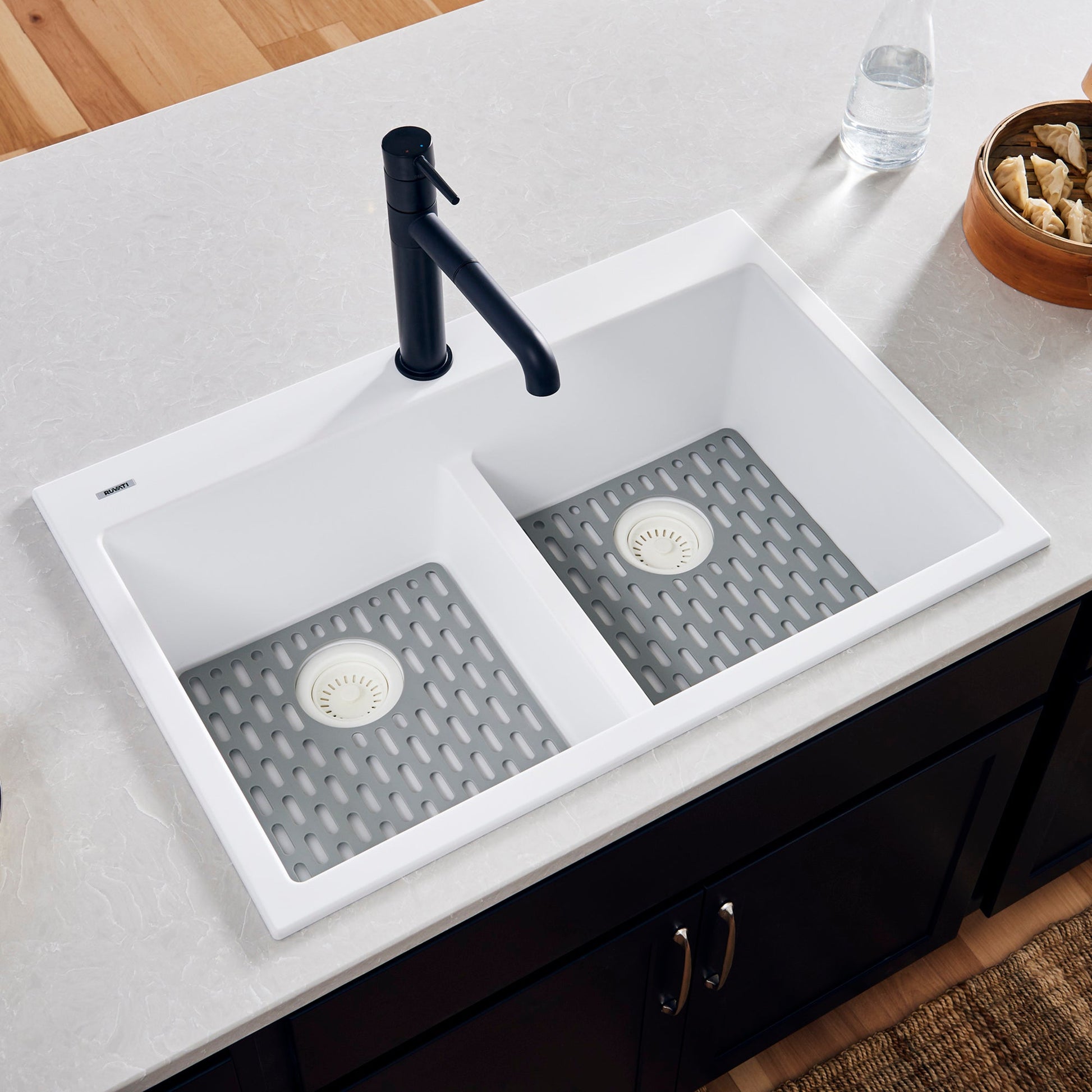 Ruvati epiGranite 33" x 22" Arctic White Drop-In Topmount Granite 50/50 Double Bowl Low Divide Kitchen Sink With Basket Strainer, Bottom Rinse Grid and Drain Assembly