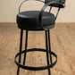 Stone County Ironworks Cedarvale 25" Hand Rubbed Pewter Swivel Iron Bar Stool With Back, Arms and Emu Espresso Faux Upholstery