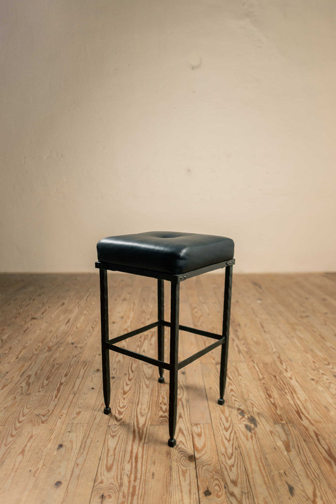 Stone County Ironworks Forest Hill 25" Hand Rubbed Bronze Iron Bar Stool With Pewter Iron Accent and Neutral Cloth Upholstery